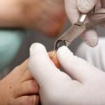 Detail view - Cutting nails with a Toenail Clipper
** Note: Shallow depth of field